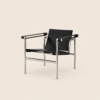 Silla LC1 en piel negra y acero cromado