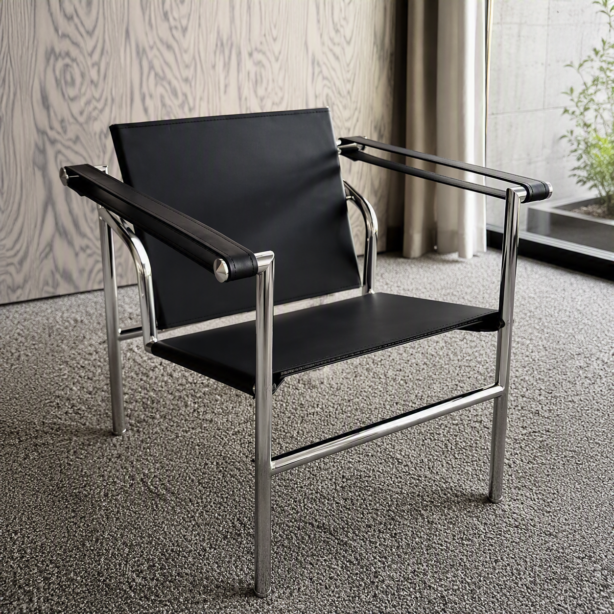 Silla LC1 en piel negra y acero cromado